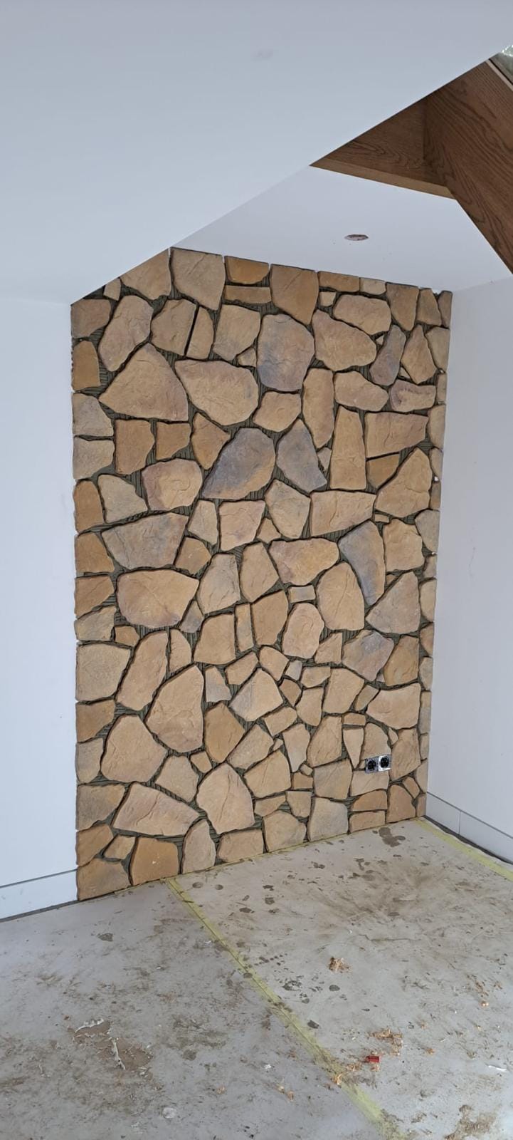 Binnenwand bekleed met natuursteen flagstones